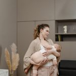 Photo of a Beautiful Mother Breastfeeding Her Baby