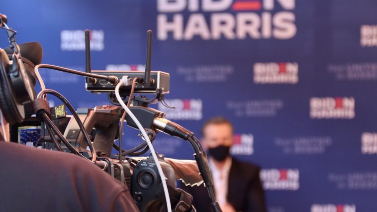 black and silver bicycle in front of the man in black shirt