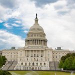 White Concrete Building Under Blue Sky