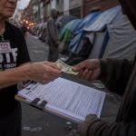 DOJ: Woman Paid Homeless on Skid Row to Sell Votes and Sign Petitions