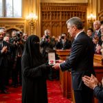 British Citizen Award Sparks Outcry Over Niqab Winner