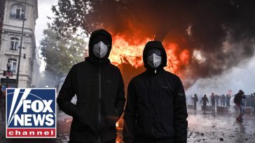 Riots ROCK Paris as HALF A MILLION flood French streets